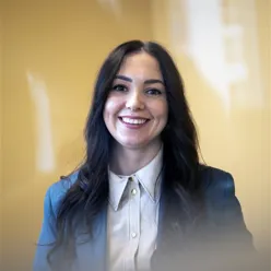 A woman smiling for the camera